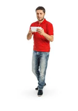 Handsome young man using tablet PC Stock Photos