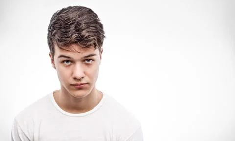 Handsome young man in white Stock Photos