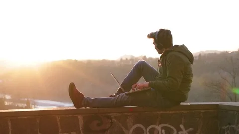 Handsome young man working on laptop Stock Footage 101847688
