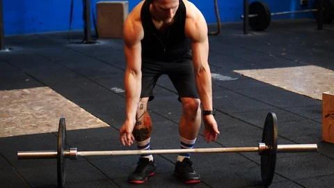 Handsome young man working out in gym Stock Footage 101487483
