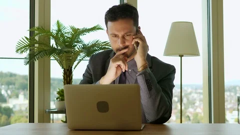 Handsome Young Successfull Entrepreneur Working on Computer Screen Stock-Footage 87712853