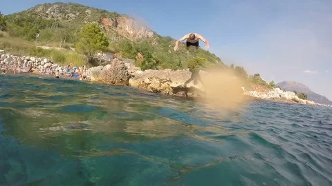 Handsome Young Swimmer Diving Underwater Diver Sun Rays Water Tropical Location Stock Footage 80258935