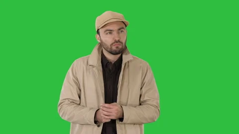 Handsome young thoughtful man has a wonderful idea on a Green Screen, Chroma Key Stockbeeldmateriaal 100371908