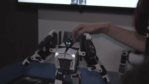Handson Biped Robot Demonstration In Workshop, Display Of Humanoid Robot In Stock Footage 325563846
