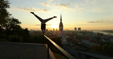 Handstand during sunrise Stock Footage