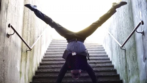 Handstanding for businessman Stock Footage 103455218