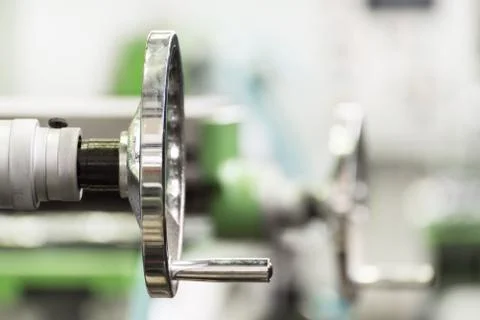 Handwheel for control of the milling machine. Stock Photos