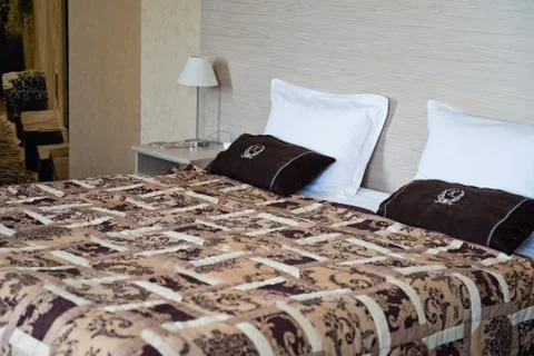Handwork cover on a bed 2952. Stock-Fotos