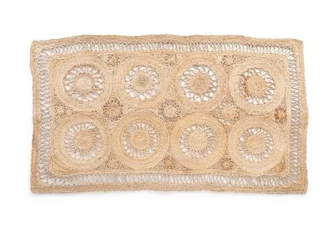 Handwoven jute table runner with circular patterns, natural fiber home decor, Stock Photos