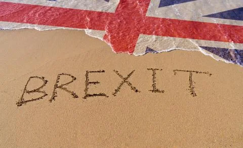 Handwrite text Brexit on sand coastline Stock Photos