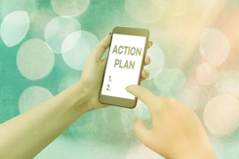 Handwriting text Action Plan. Concept meaning proposed strategy or course of 스톡 사진