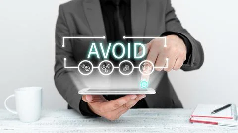 Handwriting text Avoid. Business approach Contrive not to meet someone Stop Foto stock