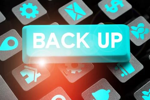 Handwriting text Back Up. Concept meaning saving important data into internet Stock Photos