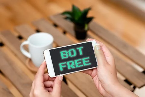 Handwriting text Bot Free. Concept meaning a computer program that works Stock Photos