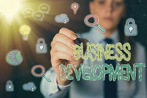Handwriting text Business Development. Concept meaning Implement Growth Value Stock Photos