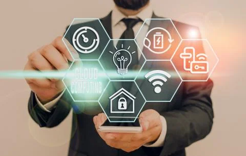 Handwriting text Cloud Computing. Concept meaning storing and accessing data and Stock Photos