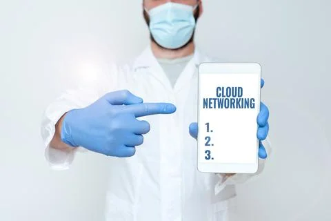 Handwriting text Cloud Networking. Business approach is term describing access Stock Photos