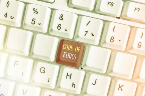 Handwriting text Code Of Ethics. Concept meaning basic guide for professional 写真素材
