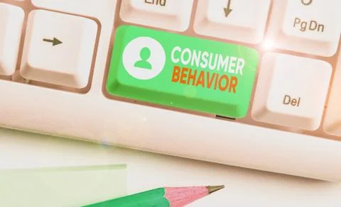 Handwriting text Consumer Behavior. Concept meaning study of how individual Stock Photos