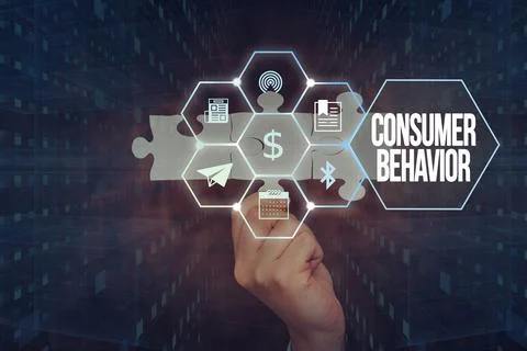 Handwriting text Consumer Behavior. Word Written on study of how individual Stock Photos