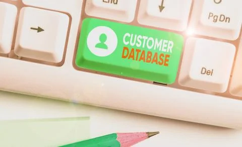 Handwriting text Customer Database. Concept meaning uptodate on customer Stock Photos