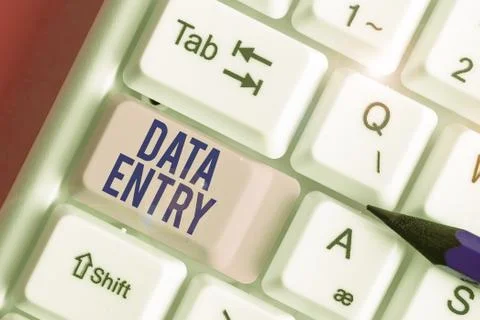 Handwriting text Data Entry. Concept meaning process of inputting data or Stock Photos
