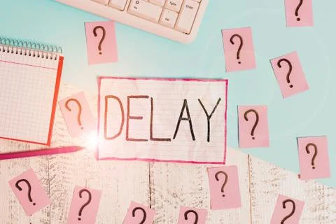 Handwriting text Delay. Concept meaning Unplanned deferment of a scheduled Stock Photos
