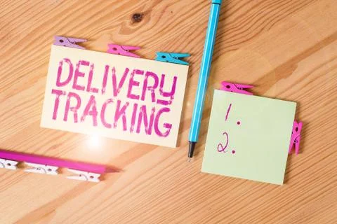 Handwriting text Delivery Tracking. Concept meaning the process of localizing Foto stock