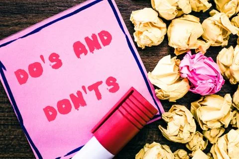 Handwriting text Do s is And Don t nots. Concept meaning Technologically Stock Photos