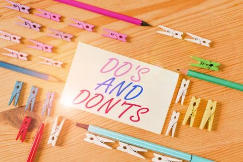 Handwriting text Do S And Don Ts. Concept meaning Technologically complication Stock Photos