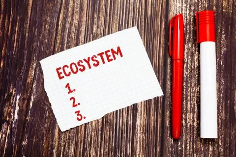 Handwriting text Ecosystem. Concept meaning biological community of interacting Fotos de archivo