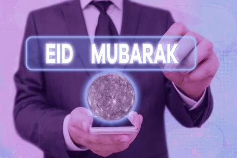 Handwriting text Eid Mubarak. Concept meaning traditional Muslim greeting Stock Photos