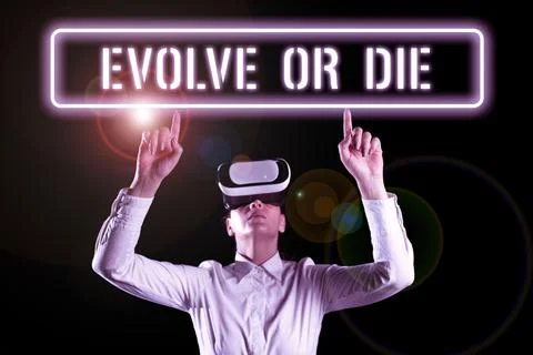 Handwriting text Evolve Or Die. Internet Concept Necessity of change grow adapt Stock Photos