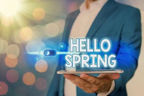 Handwriting text Hello Spring. Concept meaning Welcoming the season after the Stock Photos