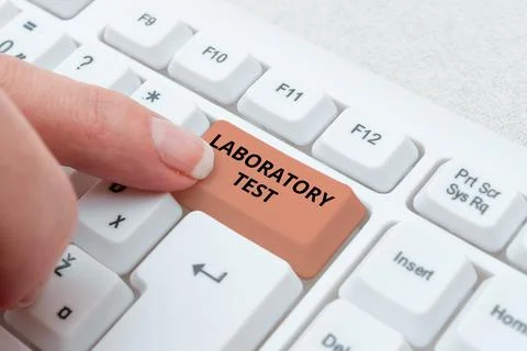 Handwriting text Laboratory Test. Concept meaning Determination of a medical Stock Photos