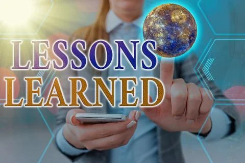 Handwriting text Lessons Learned. Concept meaning experiences distilled project Stock Photos