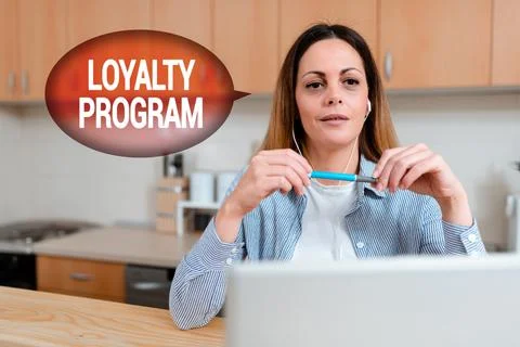 Handwriting text Loyalty Program. Conceptual photo marketing effort that provide Fotos de archivo