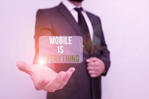 Handwriting text Mobile Is Everything. Concept meaning Handheld Computer Device Stock Photos
