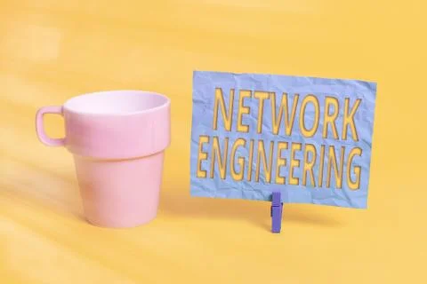 Handwriting text Network Engineering. Concept meaning professional who has the Stock Photos