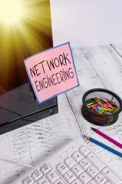 Handwriting text Network Engineering. Concept meaning professional who has the Stock Photos