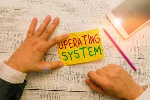 Handwriting text Operating System. Concept meaning software that supports a Stock Photos
