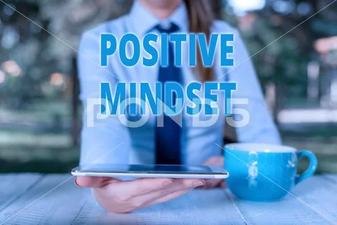 Handwriting text Positive Mindset. Concept meaning mental attitude in wich you Stock Photos