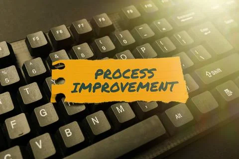 Handwriting text Process Improvement. Conceptual photo Optimization Meet New Foto stock