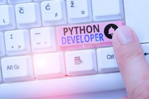 Handwriting text Python Developer. Concept meaning responsible for writing Stock Photos