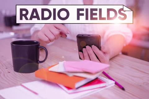 Handwriting text Radio Fields. Concept meaning electromagnetic field intensity Stock Photos