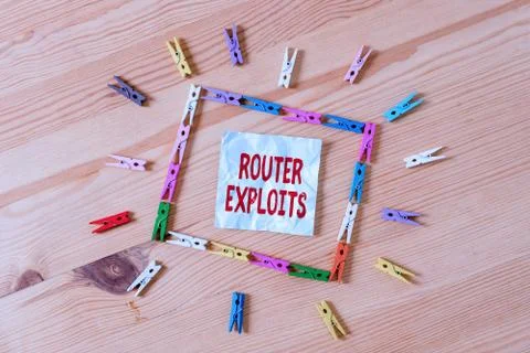 Handwriting text Router Exploits. Concept meaning takes advantage of a security Stock Photos