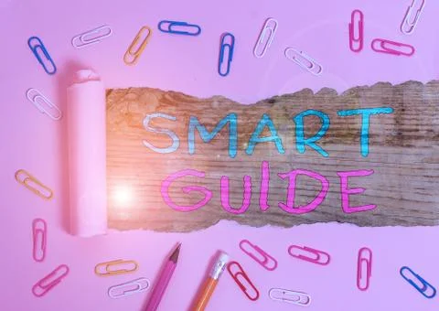 Handwriting text Smart Guide. Concept meaning used to guide the development of Stock Photos