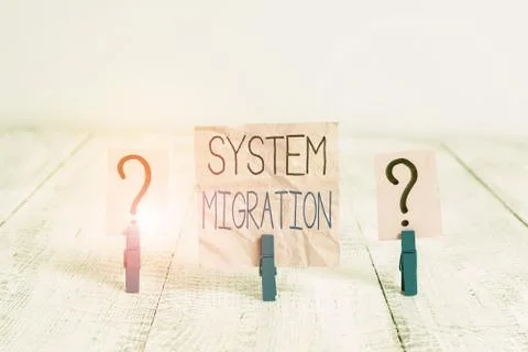 Handwriting text System Migration. Concept meaning moving from the use of one 库存照片