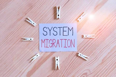 Handwriting text System Migration. Concept meaning moving from the use of one 库存照片