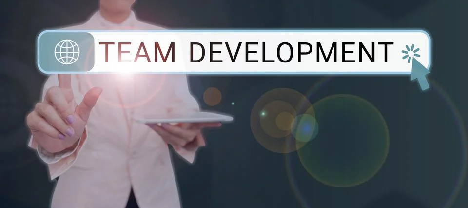 Handwriting text Team Developmentlearn why and how small groups change over time 库存照片